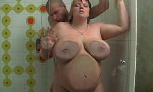 Huge BBW gives head added to gets banged encircling the shower